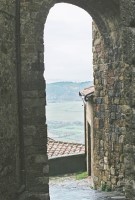 Tuscan view from one of Montepulciano's many arches